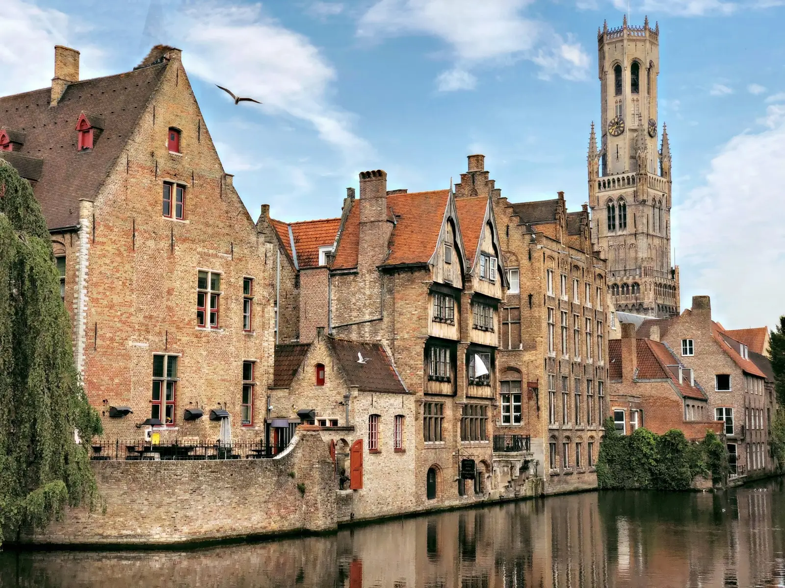 The Rozenhoedkaai by day, with the Belfry above the canal houses